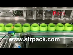 La máquina que capsula de relleno del pistón volumétrico poner crema del ungüento a la goma que embala bate el gel de la loción de la emulsión